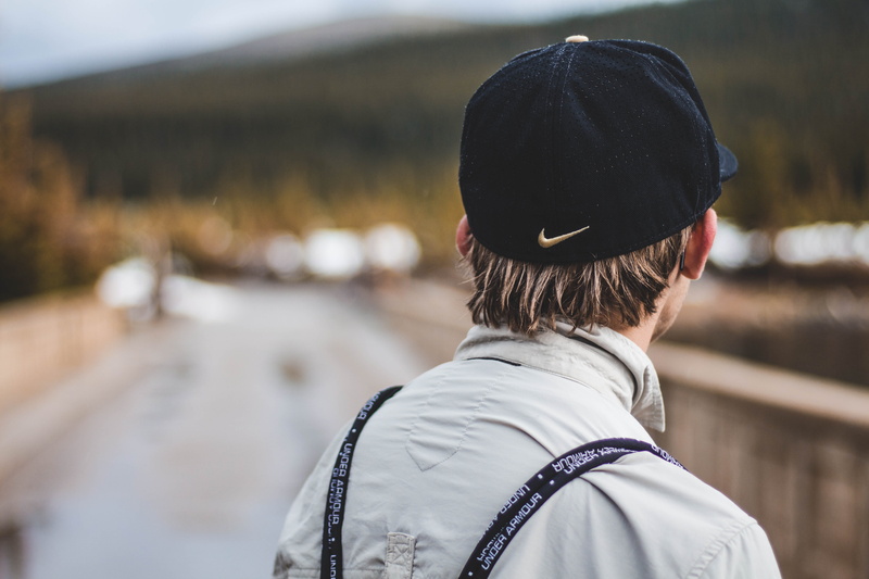 brimmed, headshot, cap, under armour, young adult, focus on foreground, gray, lifestyles, fashion, boy, leisure activity, focus, head, ear, man, person
