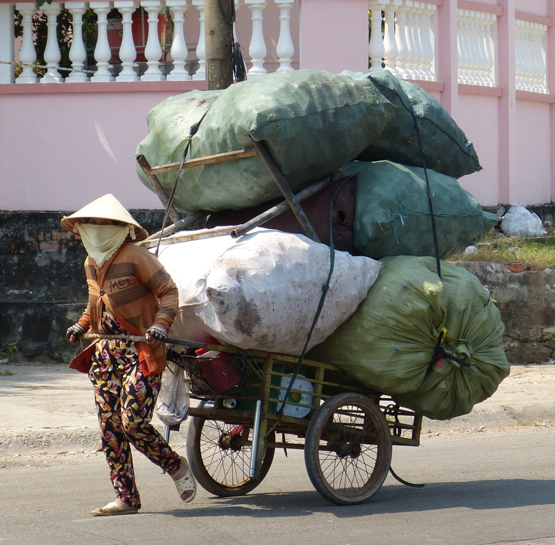 woman, garbage bag, street, one man only, outdoors, food and drink, nature, bicycle, carriage, disposal, transportation, shadow, road, cart, Vietnam, person