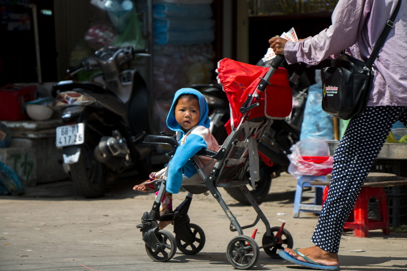 vietnam, family, leisure activity, women, a small child, lifestyles, phu quoc, childhood, view, woman, full length, men, emotion, transportation, real people