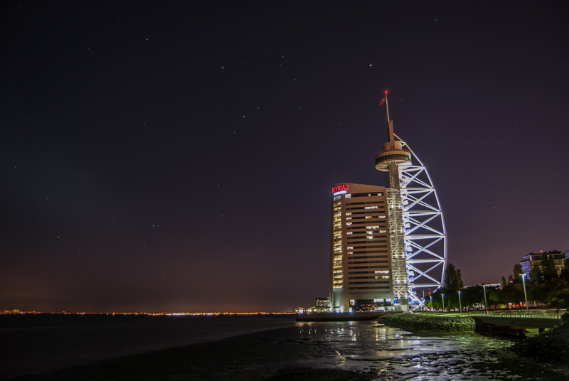 white, 2K, europe, tejo, tall - high, beside, night, building, travel destinations, no people, illuminated, astronomy, sky, rio, tagus river, outdoors