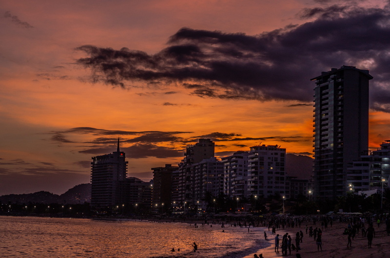 acapulco, building, holiday, tropical, orange color, city life, building exterior, beach, nature, sun, sunny, cloud - sky, sea, residential district, outdoors