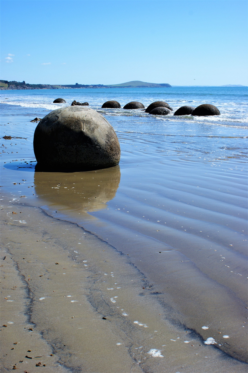 land, rock - object, idyllic, outdoors, beach, water, sky, tranquility, rock, day, new zealand, beauty in nature, 4K, sand, solid, blue, no people, scenics - nature