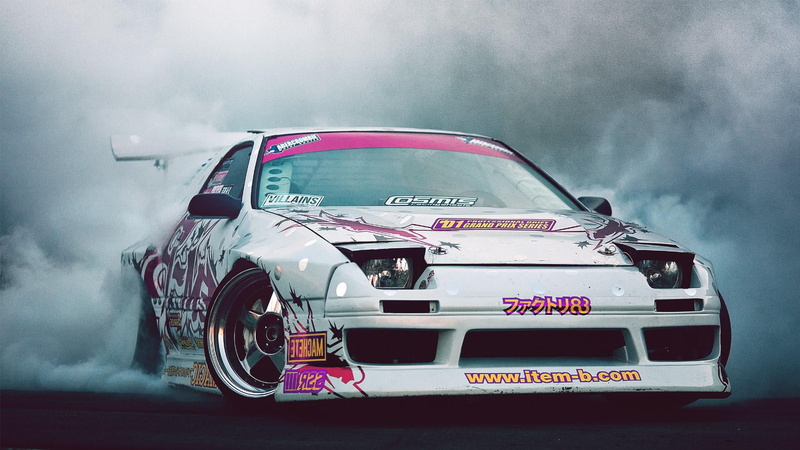 smoke - physical structure, car, land vehicle, day, automotive design, outdoors, performance car, race car, red, nature, auto racing, motor vehicle, blurred motion