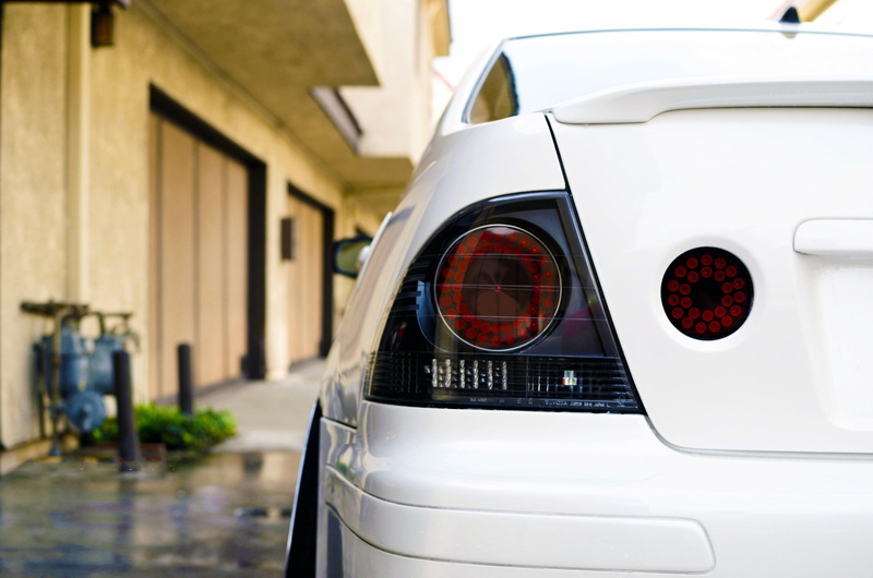 white color, building exterior, Height, architecture, focus on foreground, reflection, car, taillight, Lexus, built structure, transportation, Toyota, black