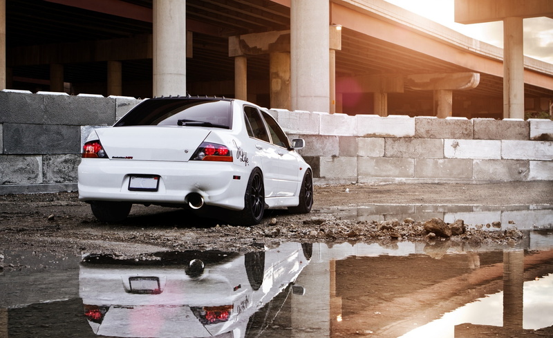 architecture, garage, nature, wet, motor vehicle, mode of transportation, reflection, water, architectural column, building exterior, city, Cars, no people