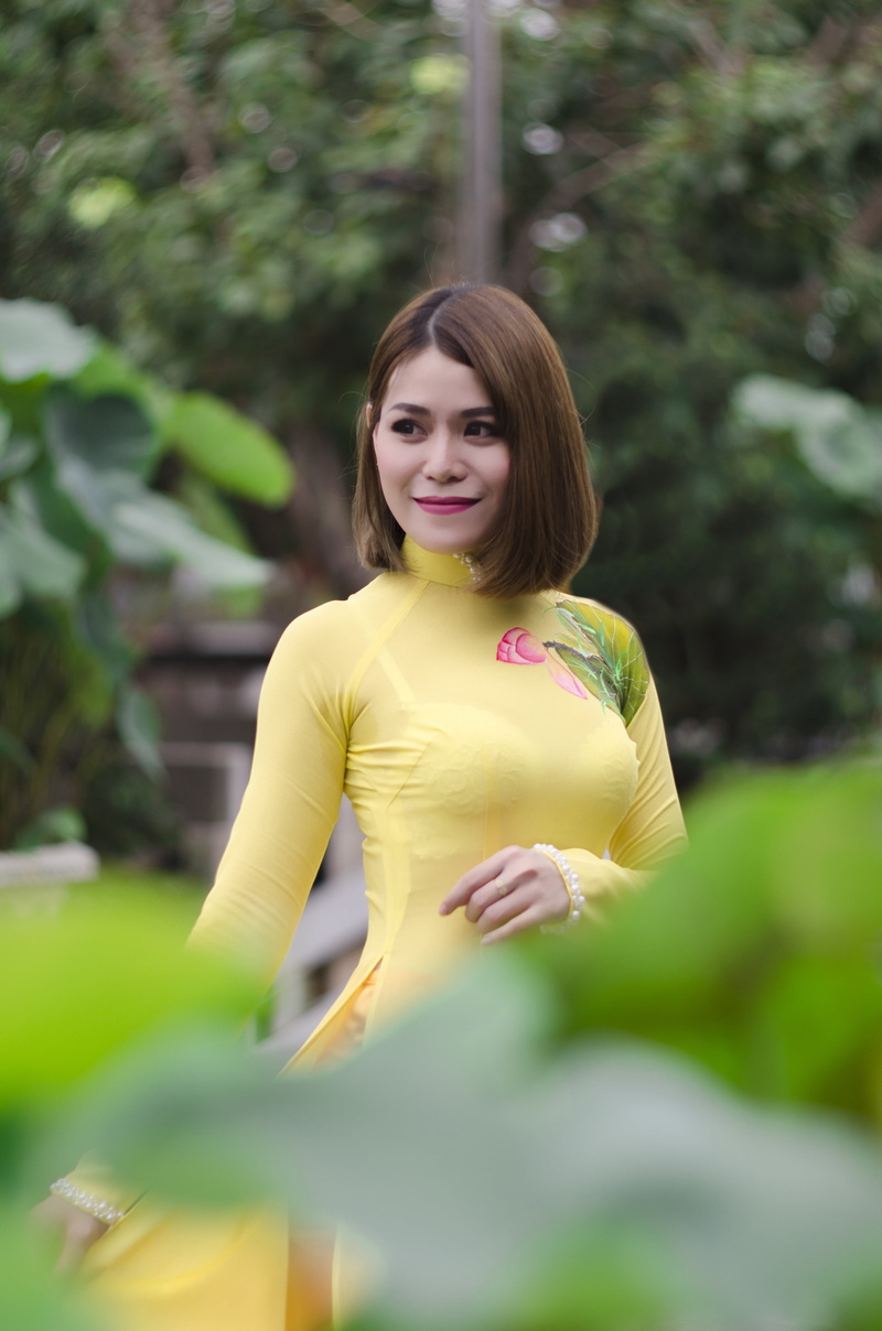 only women, plant, hairstyle, real people, portrait, casual clothing, 4K, the morning, aodai, phu, young adult, beauty, smiling, one young woman only