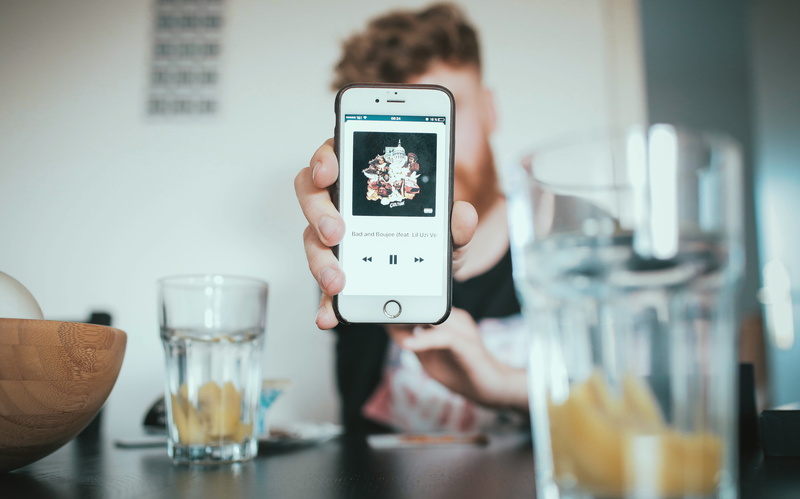 person, food, itunes, playing music, social networking, technology, one Man Only, hand, activity, glass, life, smart phone, wireless Technology, camera