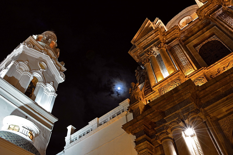 night, architectural column, history, nature, building exterior, illuminated, low angle view, quito, built structure, sky, building, ecuador, belief, colonial
