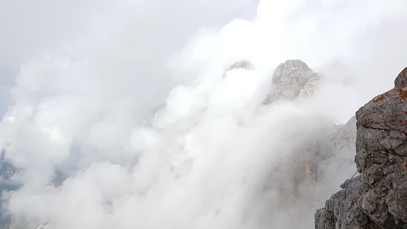 geology, solid, outdoors, steam, clouds, austria, mountains, day, non-urban scene, heat - temperature, sky, mountain, mystical, no people, mountain peak