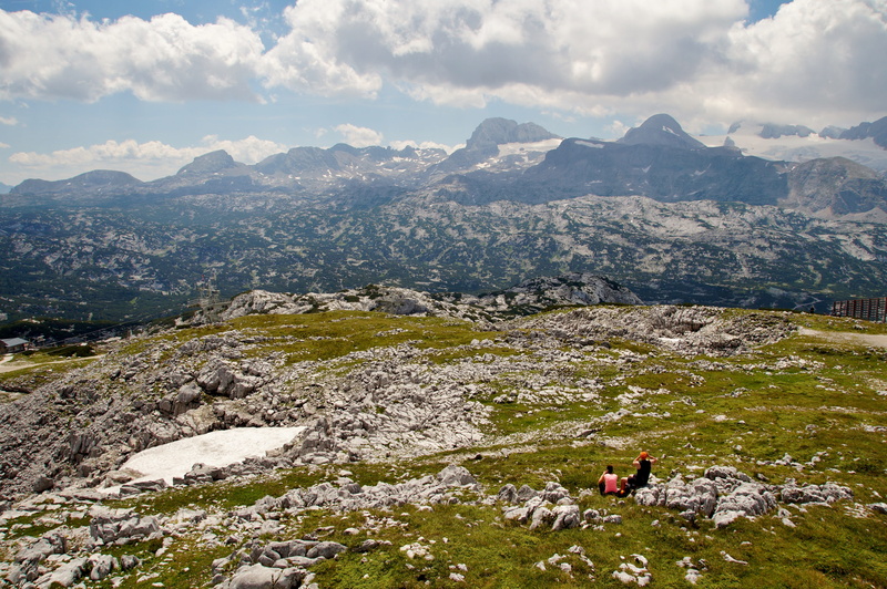 rock, tourism, beauty in nature, lifestyles, top, one person, real people, panorama, hiking, outdoors, tranquility, mountains, glacier, rock - object, mountain range