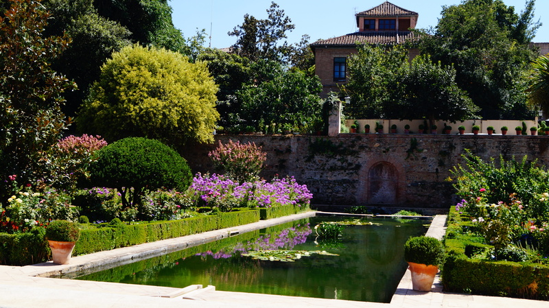 alhambra, formal garden, green color, journey, trees, palace, day, hedge, ornamental garden, building exterior, fountain, nature, history, wall, flowers