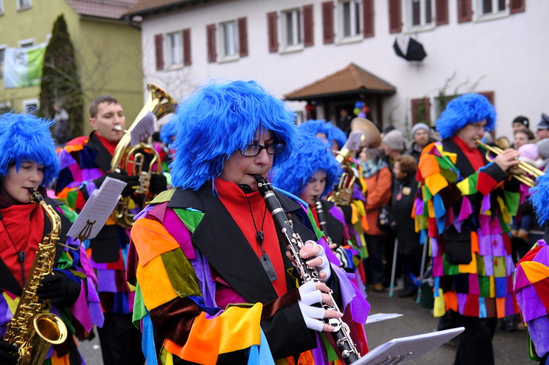arts culture and entertainment, traditional clothing, festival, carnival - celebration event, musical instrument, street, trumpet, outdoors, carnival, event