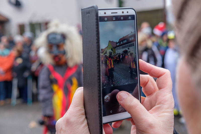 day, focus on foreground, filming, street, people, portable information device, communication, human body part, costume, photo, photographing, photography themes