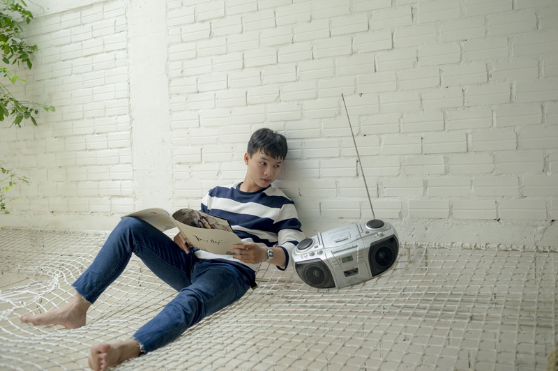 sit, catalog, males, adolescent, brick wall, day, lifestyles, relaxing, leisure, photoshop, wall - building feature, childhood, photographer, white, Asian
