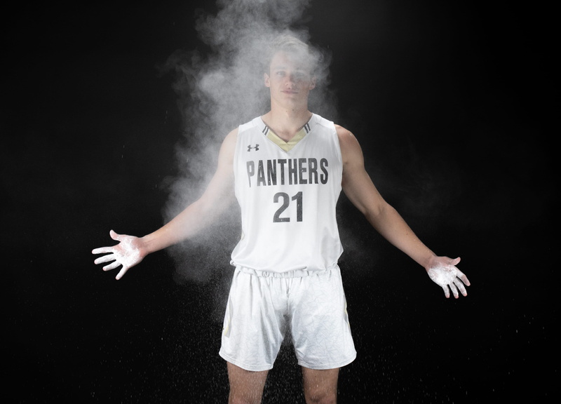one person, young adult, team, powder, portrait, teenager, jersey, sports, kicking, standing, studio shot, flour, casual clothing, text, finger, sportsman