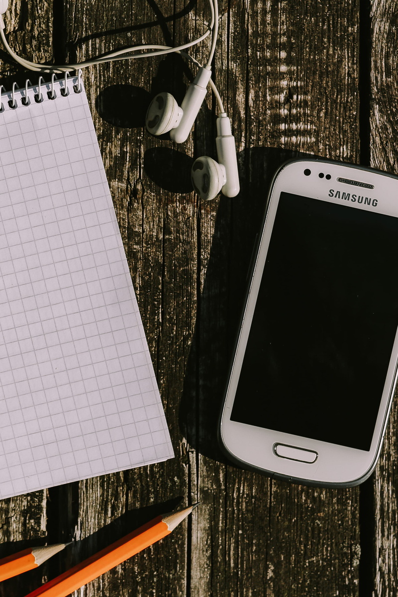 device screen, items, paper, no people, diary, wood - Material, background, technology, smart Phone, close-up, portable information device, table, still life