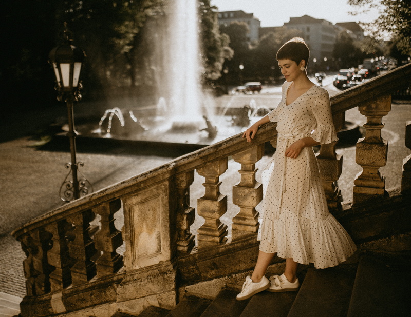 fountain, s, clothing, light, pose, building, railing, beauty, 4K, woman, elegance, white, short hair, structure, art, looking, one person, model, girlinlove