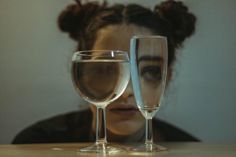 cocktail, drink, alcohol, table, household equipment, women, glass, person, wine glass, top, refreshment, beer glass, adult, wine, freshness, clear, food and drink
