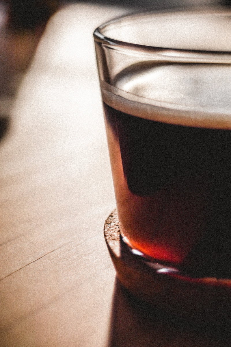 glass mug, table, beverage, coffee - drink, clear, food and drink, cafe, non-alcoholic beverage, drinking glass, saucer, human, wooden table, froth, glass