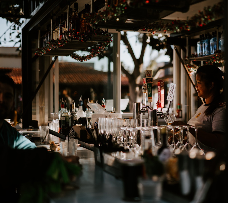 person, dispenser, bar - drink establishment, 5K, lighting, beverage, drink, sunny, indoors, service, women, travel, men, refreshment, real people, beer