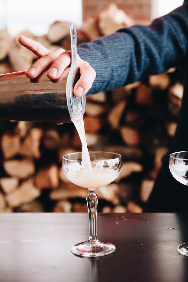 pouring, refreshment, beverage, liquor, food and drink, person, focus on foreground, martini, icing, finger, 5K, food, cocktail bar, wine glass, cake
