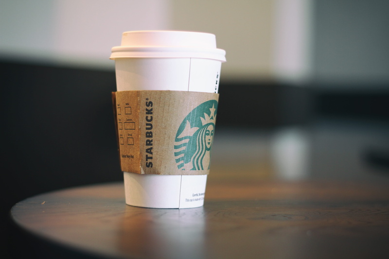 coffee cup, close-up, mug, table, coffee - drink, cup, refreshment, indoors, disposable cup, coffee shop, container, no people, wood - material, wooden table