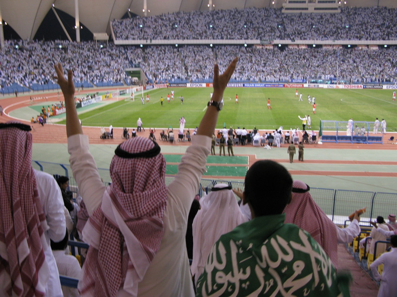 crowd, outdoors, 4K, fan - enthusiast, adult, sport, saudi arabia, seat, competition, excitement, women, leisure activity, large group of people, human arm