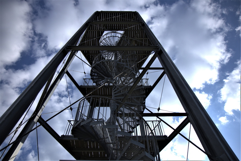 built structure, stairs, travel destinations, day, architecture, modern, spiral staircase, cloud - sky, emergence, looking up, nature, city, low angle shot