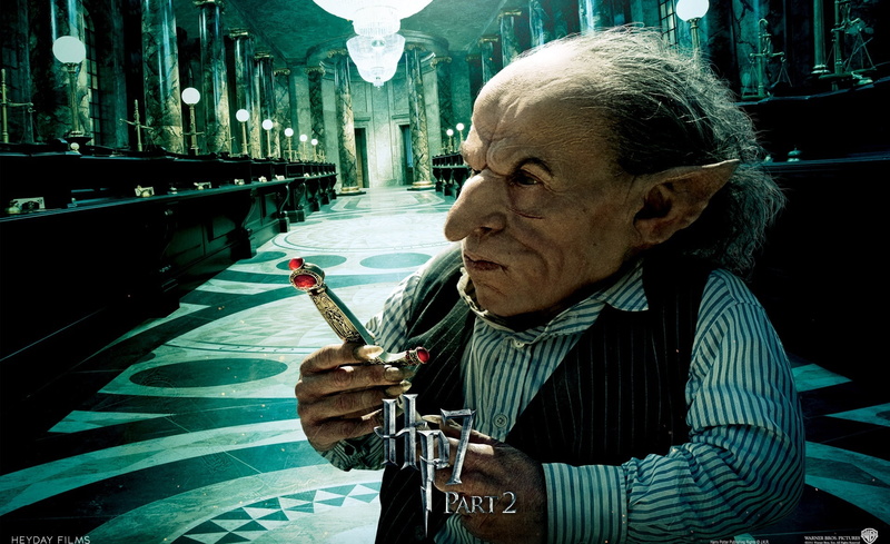 glass, front view, griphook, one person, harry potter and the deathly hallows, waist up, indoors, senior adult, casual clothing, harry, real people, holding
