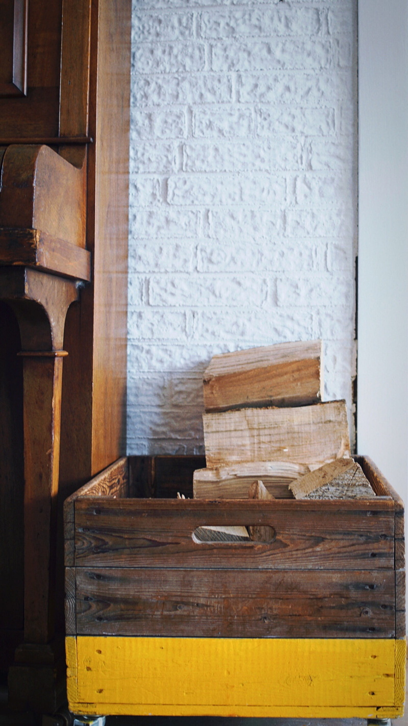 building, day, cupboard, drawer, fire wood, brick wall, wall - building feature, wooden crate, seat, furniture, stack, logs, table, piano, architecture