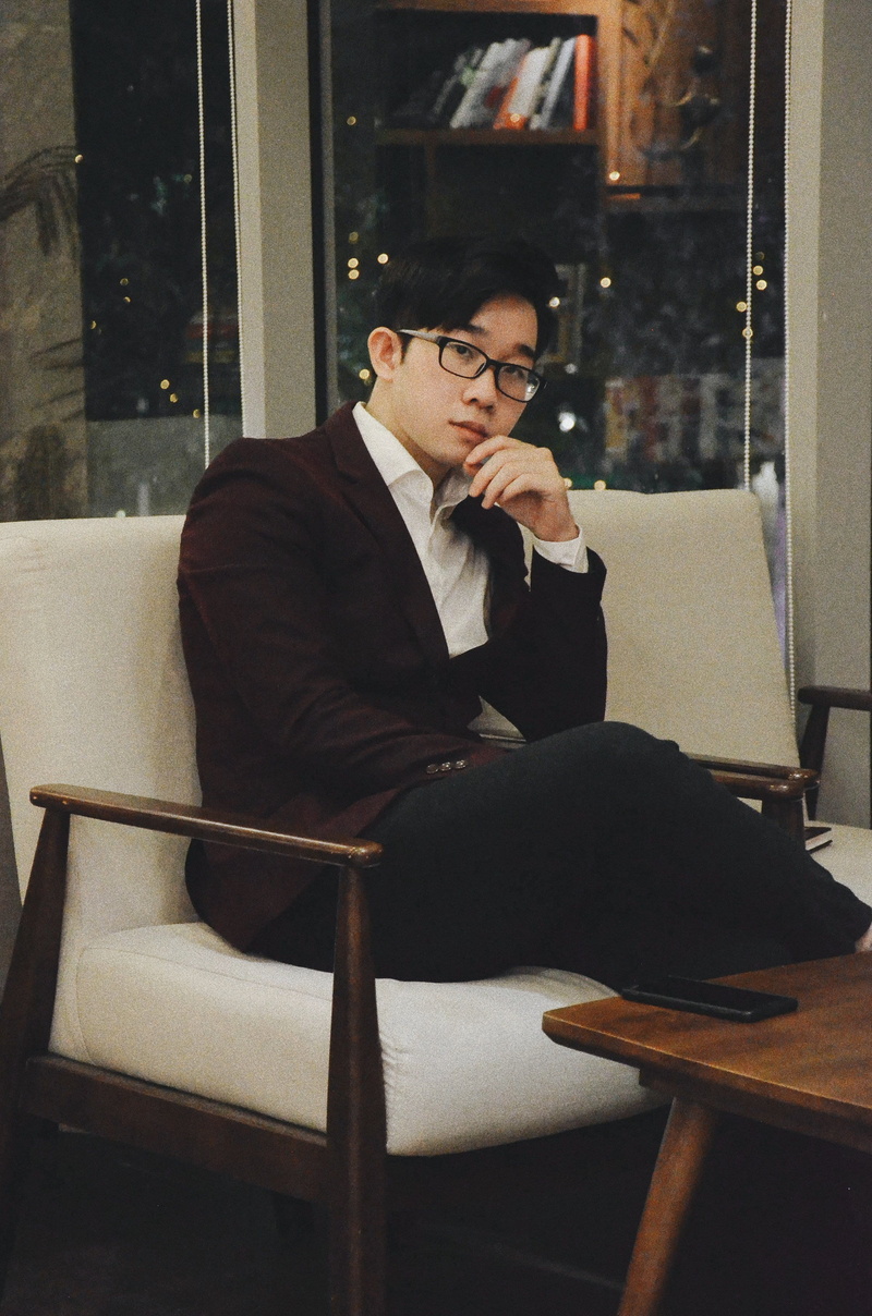 vintage, plywood, furniture, one person, chair, young men, sofa, couch, front view, overcoat, sitting, table, men, well-dressed, real people, business