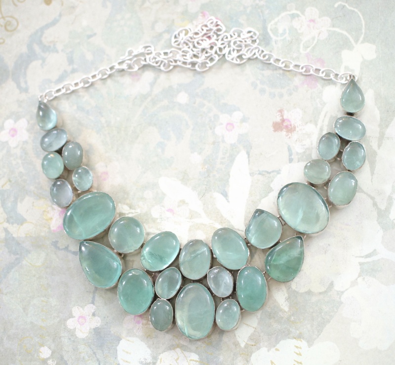 pearl jewelry, wealth, semiprecious, green, close-up, high angle view, white, sterling, stone, jewelry, no people, pattern, abundance, gemstone, choker