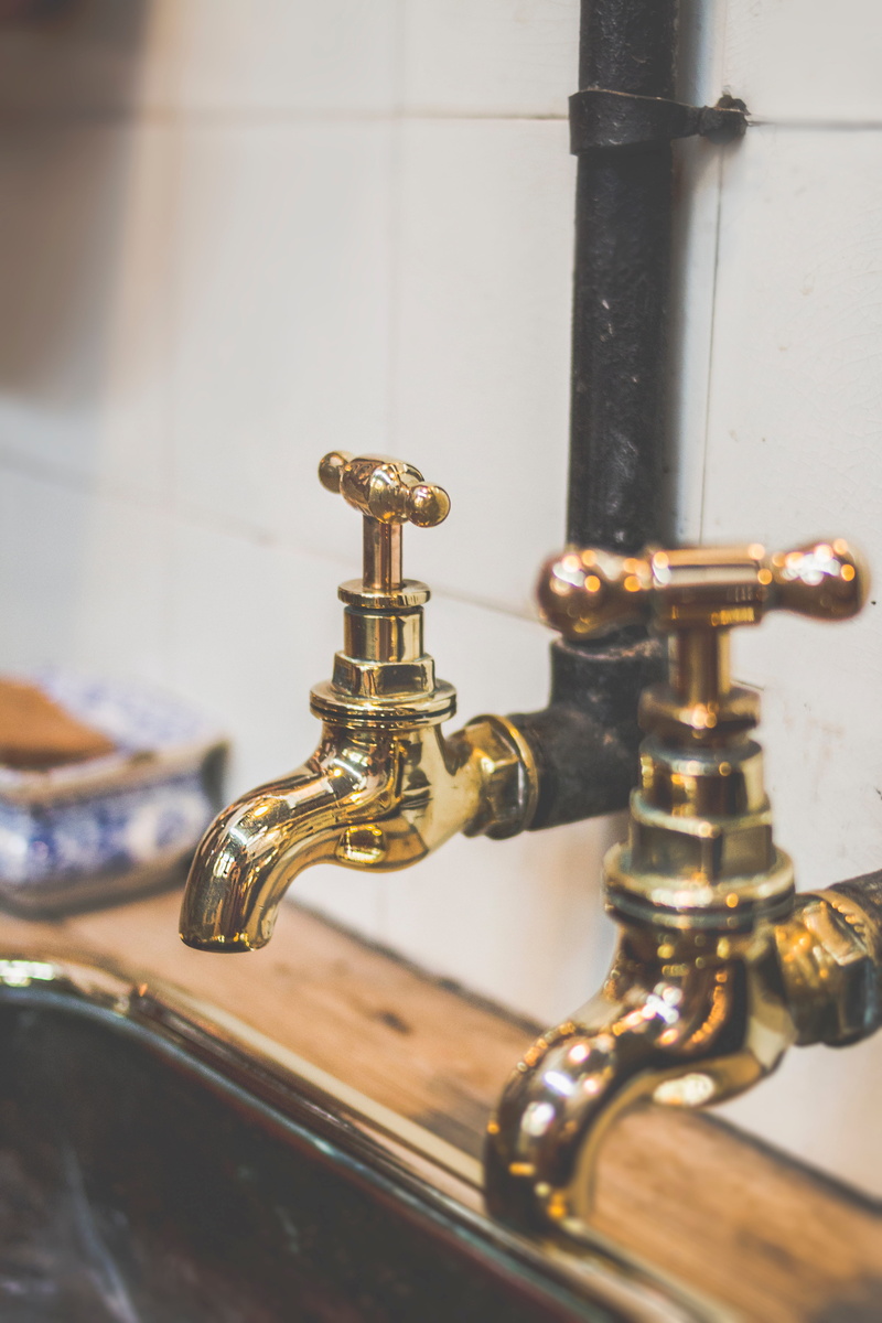 selective focus, gold, pipe - tube, vintage, brass, plumbing, classic, valve, focus on foreground, no people, domestic bathroom, taps, faucet, pipes, close-up