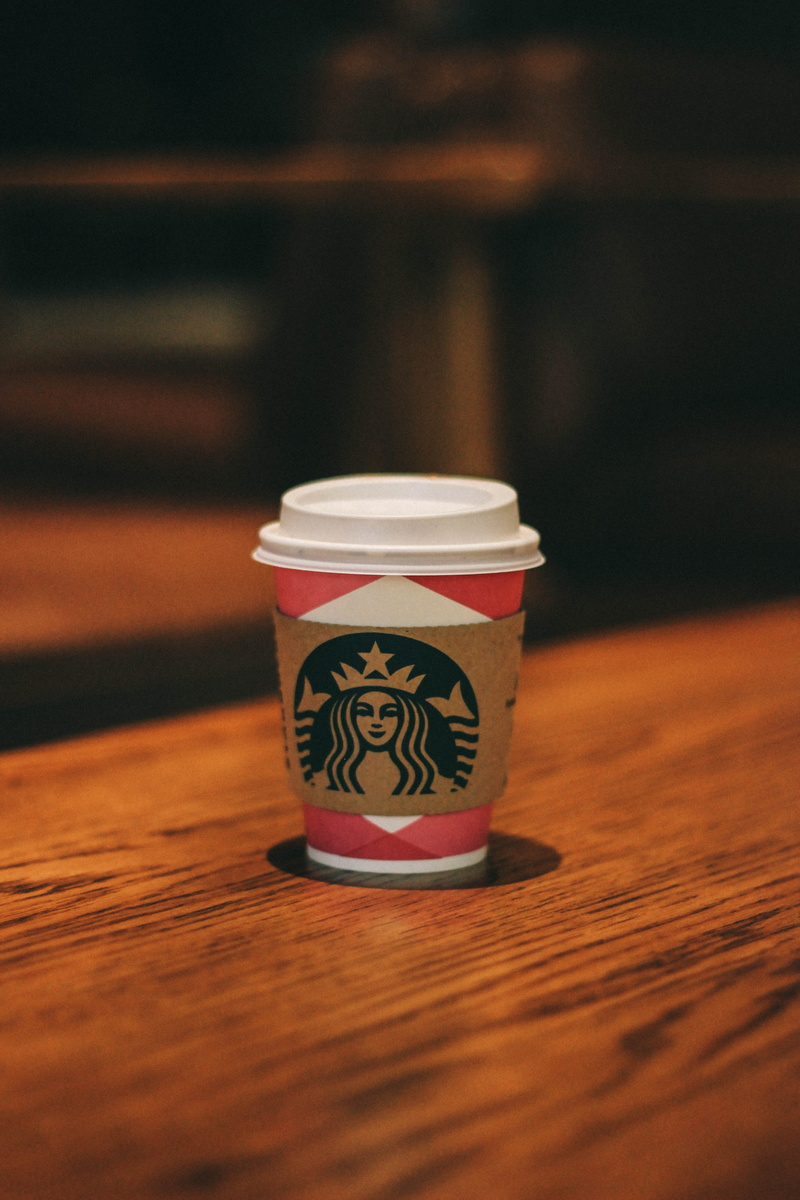 cafeteria, pink, design, brown, close-up, art and craft, restaurant, indoors, wood - material, single object, triangle, starbucks, cup, drink, creativity