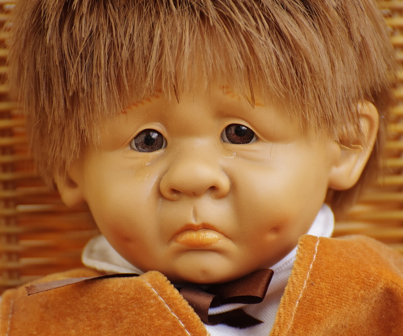 lifestyles, headshot, children, males, front view, portrait, one person, men, hairstyle, toys, people, small, childhood, boys, human Face, child, sad, cute