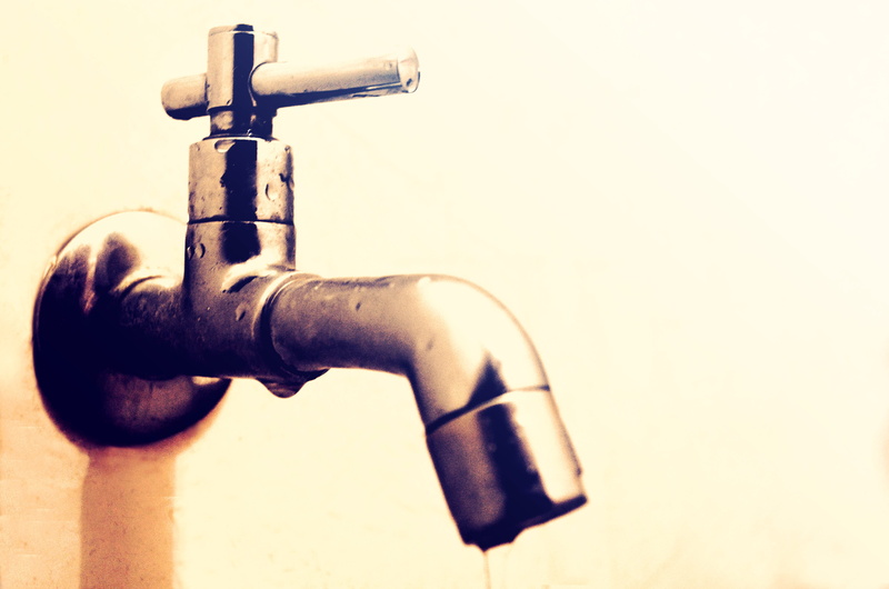 close-up, man made object, focus on foreground, tap, wall - building feature, man made, single object, control, studio shot, no people, safety, metal, machine valve