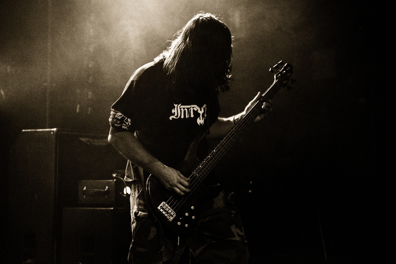 artist, performance, indoors, guitar, popular music concert, instruments, bass, guitarist, gig, musical instrument, bassist, rock music, stage, entertainment occupation