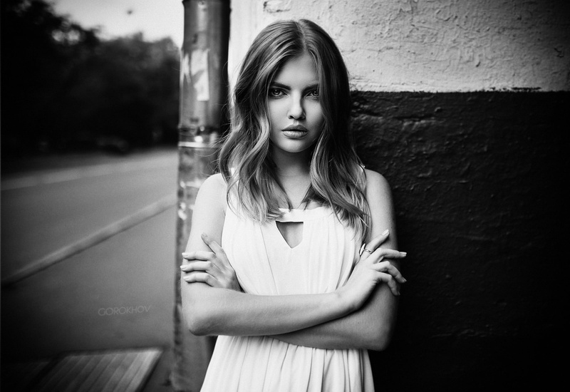 front view, hair, portrait, city, teenager, sadness, beauty, arms on chest, women, waist up, beautiful woman, arms crossed, young women, young adult, dress
