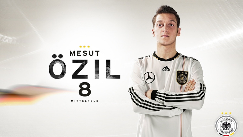 mesut ozil footballers germany arms crossed, looking at camera, one person, confidence, text, standing, serious, men, responsibility, indoors, 1080P, expertise