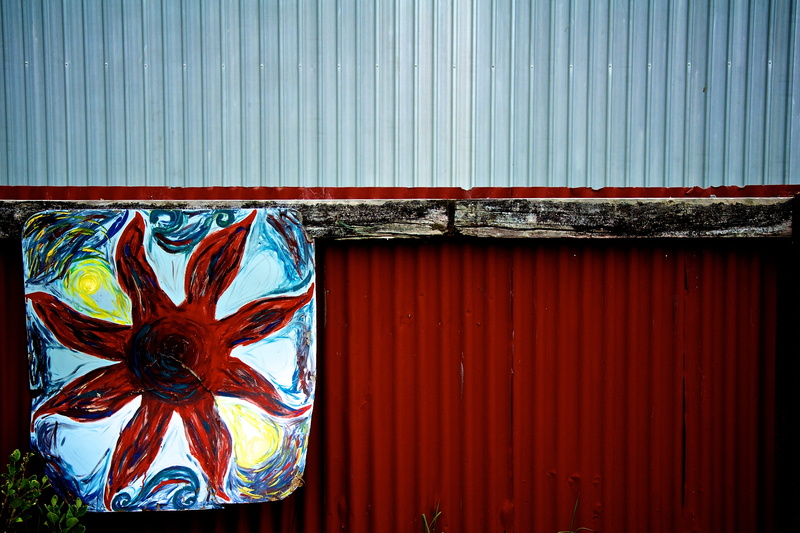 floral pattern, blue, multi colored, new zealand, metal, built structure, striped, no people, red, outdoors, patriotism, architecture, wall - building feature