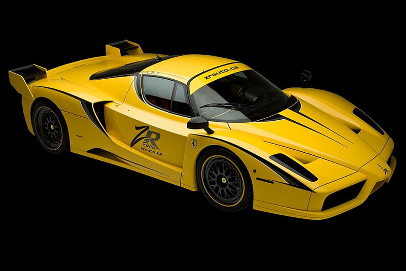 yellow, indoors, black background, mode of transportation, motorsport, motor vehicle, shiny, wheel, land vehicle, car, xx, sport, evolution, stationary