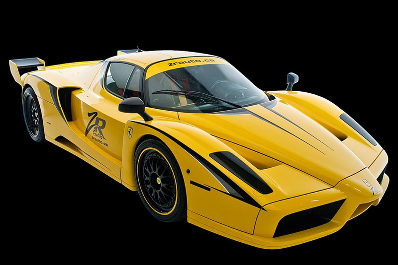 studio shot, stationary, evolution, land vehicle, professional sport, racecar, competition, black background, sport, motorsport, auto racing, car, outdoors