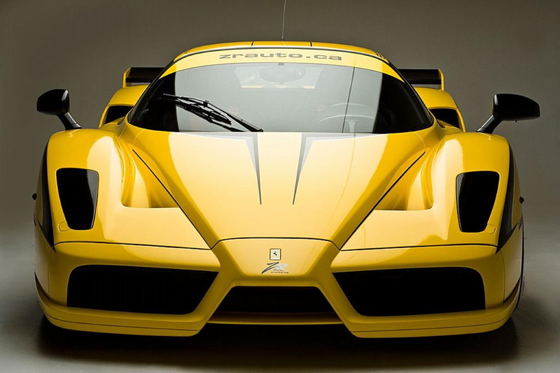 transportation, studio shot, yellow, car, luxury, stationary, taxi, xx, front view, mode of transportation, modern, edo, indoors, competition, no people