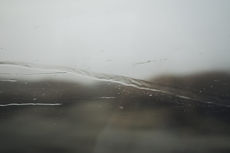drop, no people, full frame, beauty in nature, window, travel, fog, close-up, nature, foggy, motion, glass - material, scenics - nature, transparent, train