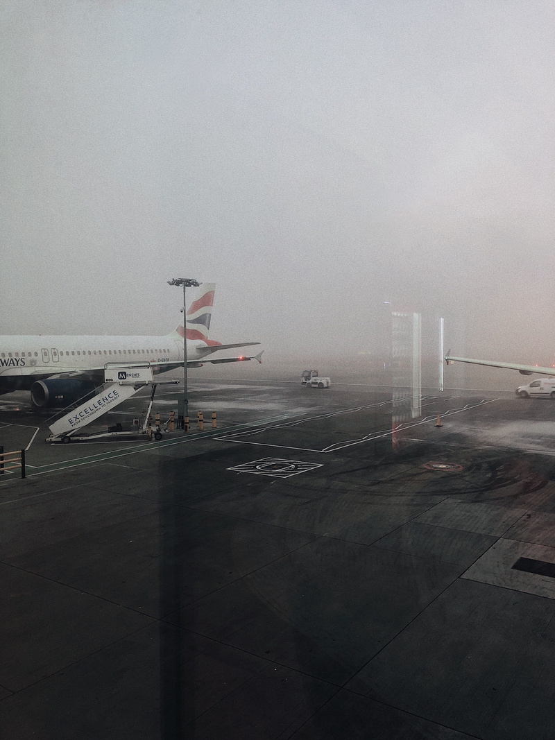 road, parking garage, white, architecture, foggy, vehicle, no people, airliner, outdoors, commercial airplane, pollution, plane, airport runway, tarmac
