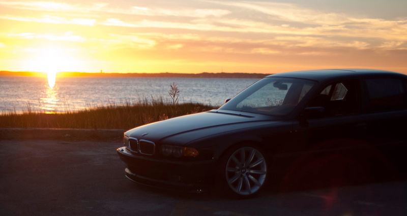 scenics - nature, mode of transportation, wheel, transportation, black, sunset, no people, s, nature, sun, sea, orange color, sunlight, 750il, water, beauty in nature