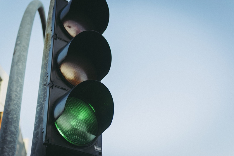 traffic light, sky, safety, road sign, yellow, illuminated, green color, street, green light, black, light, guidance, red, road signal, intersection, stoplight