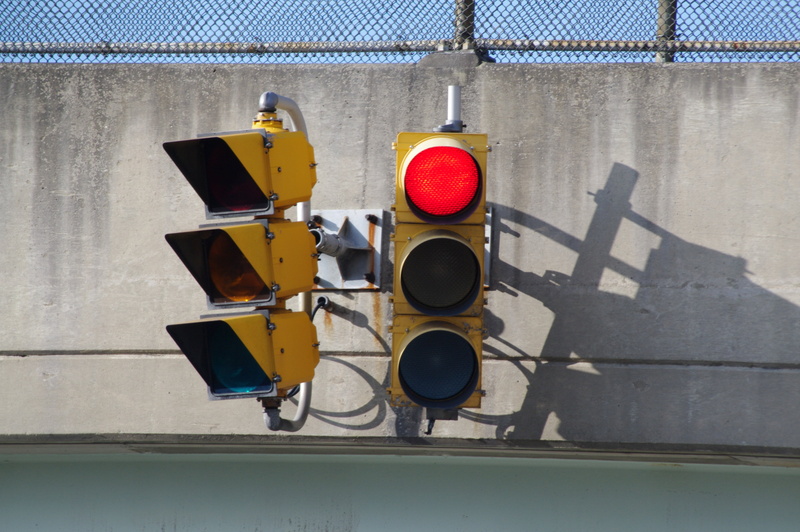 sunlight, traffic, red, light, red light, travel, wall - building feature, 4K, no people, road, shadow, safety, security, stoplight, outdoors, built structure