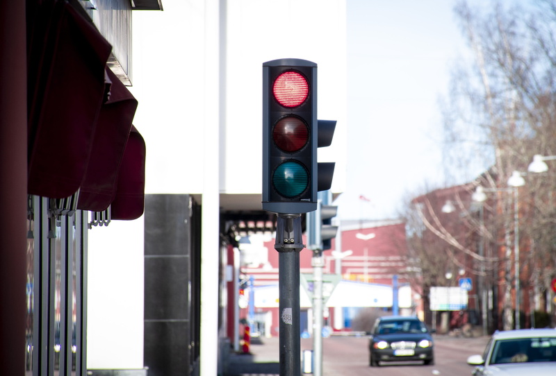 transportation, car, road, stoplight, light, traffic lights, sign, traffic, day, motor vehicle, street, built structure, building exterior, thinking about staying
