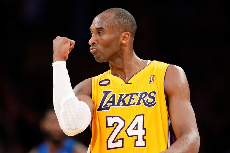 sport, one person, human arm, human limb, black background, competitive sport, portrait, athlete, competition, limb, shaved head, kobe bryant  photos, sports clothing